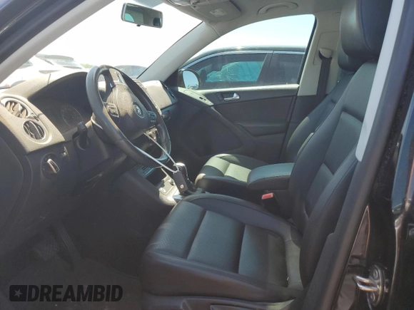 2015 Volkswagen Tiguan SEL with VIN WVGAV7AX2FW524276, listed as a Copart auction lot 63631995 with 87,284 mi miles and Salvage title. Bid and sale history available at DreamBid. Image 7.