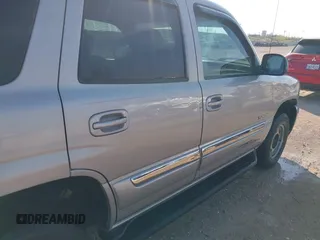 2005 GMC Yukon SLT with VIN 1GKEK13T95R203827, listed as a IAAI auction lot 41815086 with 136,671 mi miles. Bid and sale history available at carsss.com. Image 6.