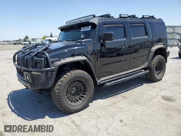 2005 Hummer H2 SUV z VIN 5GRGN23U05H117630, wystawiony jako Copart lot #57087305 z przebiegiem 60 260 mil mil oraz Szkoda całkowita • Salvage title. Historia ofert i sprzedaży dostępna na DreamBid. Obrazek 1.