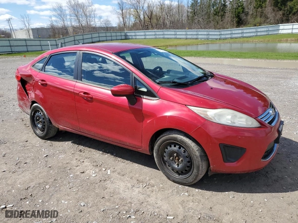 2011 Ford Fiesta SE with VIN 3FADP4BJ1BM179648, listed as a Copart auction lot 54203605 with 132,003 mi miles and Salvage Title. Bid and sale history available at carsss.com. Image 4.