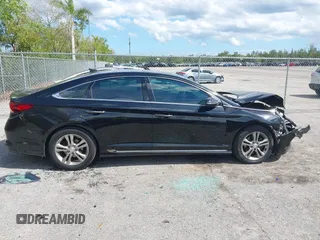2018 Hyundai Sonata SEL with VIN 5NPE34AF3JH647018, listed as a IAAI auction lot 41687419 with 97,561 mi miles and . Bid and sale history available at DreamBid. Image 13.