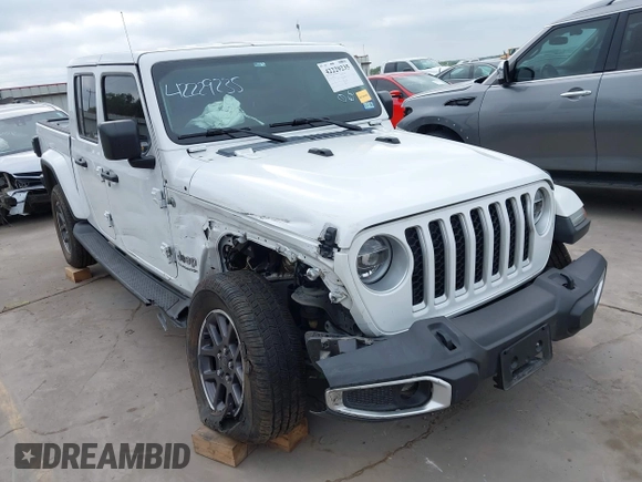 2021 Jeep Gladiator High Altitude with VIN 1C6HJTFG8ML551570, listed as a IAAI auction lot 42229235 with 56,959 mi miles and . Bid and sale history available at DreamBid. Image 6.