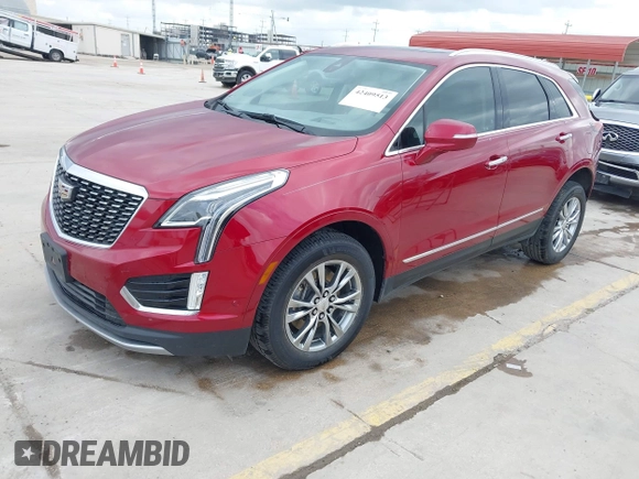 2020 Cadillac XT5 Premium Luxury FWD z VIN 1GYKNCRS8LZ228516, wystawiony jako IAAI lot #42409513 z przebiegiem 54 765 mil mil oraz . Historia ofert i sprzedaży dostępna na DreamBid. Obrazek 18.