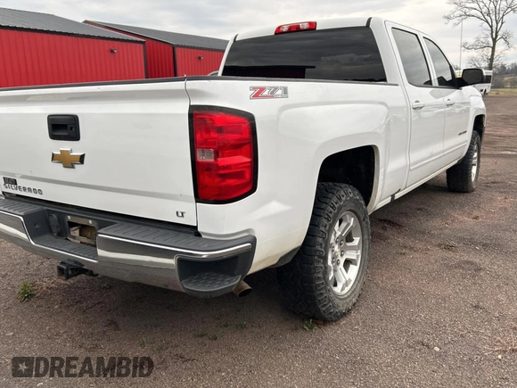 2017 Chevrolet Silverado 1500 LT with VIN 1GCUKREC0HF183203, listed as a Copart auction lot 47497405 with 163,474 mi miles and Clean Title. Bid and sale history available at DreamBid. Image 4.
