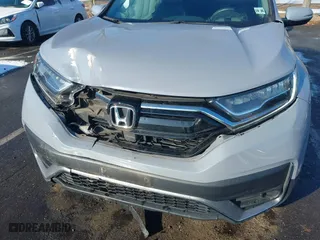 2021 Honda CR-V Touring with VIN 2HKRW2H97MH680203, listed as a IAAI auction lot 41357188 with 50,211 mi miles. Bid and sale history available at carsss.com. Image 6.