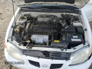 2000 Hyundai Elantra GLS z VIN KMHJF35F4YU038977, wystawiony jako Copart lot #80800144 z przebiegiem 97 373 mil mil oraz Czysty tytuł • Clean title. Historia ofert i sprzedaży dostępna na DreamBid. Obrazek 11.