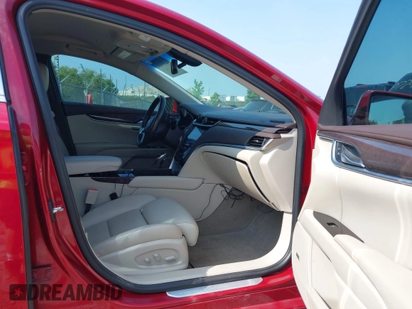 2013 Cadillac XTS Luxury z VIN 2G61P5S34D9139924, wystawiony jako IAAI lot #42504191 z przebiegiem 140 744 mil mil oraz . Historia ofert i sprzedaży dostępna na DreamBid. Obrazek 5.