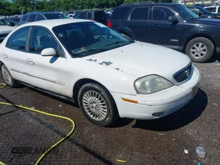 2002 Mercury Sable GS z VIN 1MEFM50UX2G603478, wystawiony jako IAAI lot #42292178 z przebiegiem 163 815 mil mil oraz . Historia ofert i sprzedaży dostępna na DreamBid. Obrazek 1.
