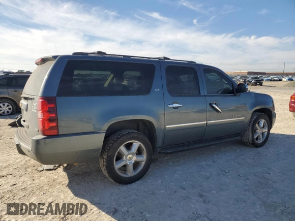 2010 Chevrolet Suburban LTZ with VIN 1GNUKKE37AR165641, listed as a Copart auction lot 88939935 with 203,190 mi miles and Salvage title. Bid and sale history available at DreamBid. Image 3.