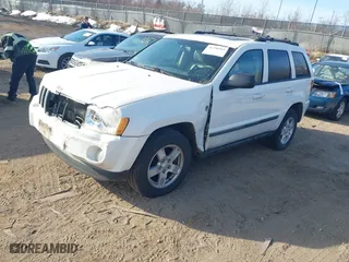 2007 Jeep Grand Cherokee Laredo with VIN 1J8HR48N97C692969, listed as a IAAI auction lot 41798961 with 167,432 mi miles. Bid and sale history available at carsss.com. Image 2.