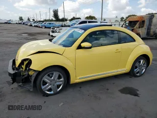 2013 Volkswagen Beetle 2.5L w/Sun/Sound/Nav with VIN 3VWJX7AT6DM681802, listed as a Copart auction lot 51285715 with 54,481 mi miles and Salvage Title. Bid and sale history available at DreamBid. Image 1.