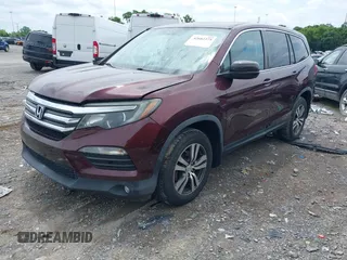 2016 Honda Pilot EX-L with VIN 5FNYF6H55GB082646, listed as a IAAI auction lot 42682375 with 96,314 mi miles and . Bid and sale history available at DreamBid. Image 17.
