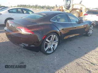 2012 Fisker Karma EcoSport z VIN YH4K14AA0CA000444, wystawiony jako IAAI lot #41749223 z przebiegiem 69 793 mil mil oraz . Historia ofert i sprzedaży dostępna na DreamBid. Obrazek 4.