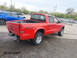 2003 Dodge Dakota Sport with VIN 1D7HG38X63S212434, listed as a IAAI auction lot 42030739 with 181,098 mi miles. Bid and sale history available at carsss.com. Image 4.