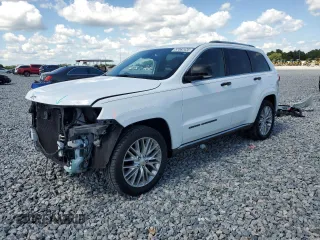 2018 Jeep Grand Cherokee Summit with VIN 1C4RJEJG7JC228316, listed as a Copart auction lot 57062435 with 99,442 mi miles and Salvage title. Bid and sale history available at DreamBid. Image 1.