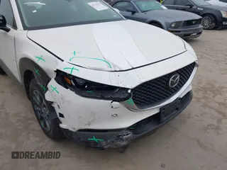 2022 Mazda CX-30 S with VIN 3MVDMBALXNM422418, listed as a IAAI auction lot 41531552 with 21,909 mi miles and . Bid and sale history available at carsss.com. Image 6.