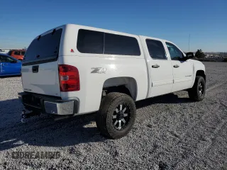 2013 Chevrolet Silverado 1500 LT with VIN 3GCPKSE72DG230652, listed as a Copart auction lot 83632464 with 121,411 mi miles and Salvage Title. Bid and sale history available at DreamBid. Image 3.