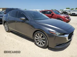 2021 Mazda 3 Premium with VIN JM1BPADL9M1319945, listed as a Copart auction lot 52902425 with 74,221 mi miles and Salvage title. Bid and sale history available at DreamBid. Image 4.