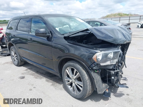 2013 Dodge Durango SXT with VIN 1C4RDJAG4DC697450, listed as a IAAI auction lot 42336657 with 177,476 mi miles and . Bid and sale history available at DreamBid. Image 1.