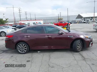 2019 Kia Optima LX z VIN 5XXGT4L37KG354649, wystawiony jako IAAI lot #42130410 z przebiegiem 61 315 mil mil oraz . Historia ofert i sprzedaży dostępna na DreamBid. Obrazek 12.