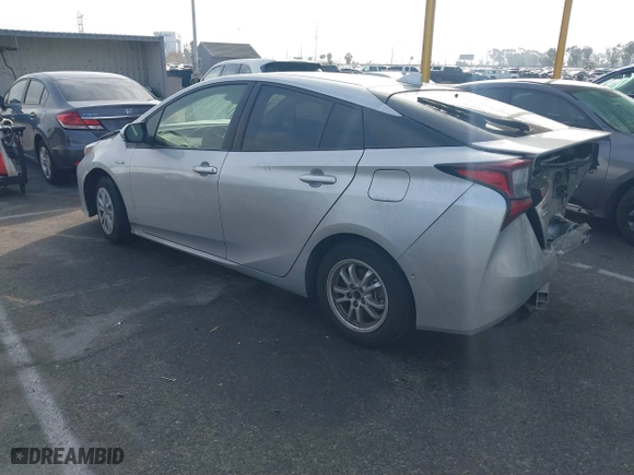 2021 Toyota Prius L Eco with VIN JTDKAMFU8M3135514, listed as a IAAI auction lot 40977114 with 70,451 mi miles. Bid and sale history available at carsss.com. Image 3.