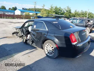 2015 Chrysler 300 Limited with VIN 2C3CCAAGXFH779843, listed as a IAAI auction lot 40284433 with 251,182 mi miles and . Bid and sale history available at DreamBid. Image 3.