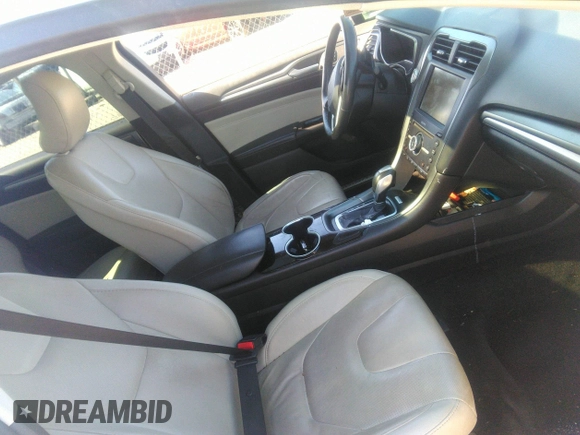 2016 Ford Fusion Titanium with VIN 3FA6P0K93GR331947, listed as a IAAI auction lot 41828409 with 181,555 mi miles and . Bid and sale history available at DreamBid. Image 5.