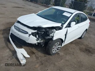 2016 Hyundai Accent SE with VIN KMHCT4AE2GU105708, listed as a IAAI auction lot 41886856 with 146,800 mi miles. Bid and sale history available at carsss.com. Image 2.