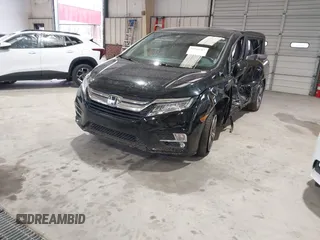 2018 Honda Odyssey Touring with VIN 5FNRL6H87JB105410, listed as a IAAI auction lot 41860707 with 91,908 mi miles. Bid and sale history available at carsss.com. Image 2.
