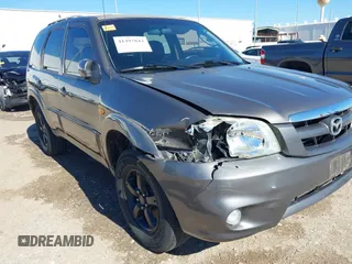 2005 Mazda Tribute S with VIN 4F2CZ06175KM49643, listed as a IAAI auction lot 41397843 with 185,088 mi miles and . Bid and sale history available at carsss.com. Image 6.