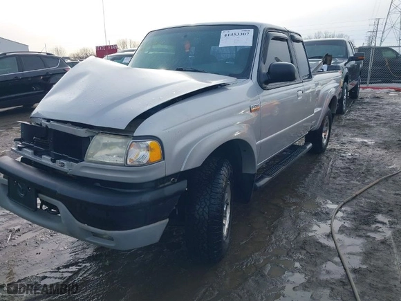 2003 Mazda B-Series 4WD Truck with VIN 4F4ZR47E63TM15713, listed as a IAAI auction lot 41453307 with 185,019 mi miles. Bid and sale history available at carsss.com. Image 2.