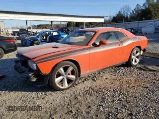 2010 Dodge Challenger SRT-8 with VIN 2B3CJ7DW8AH308873, listed as a Copart auction lot 88857005 with 162,537 mi miles and Salvage title. Bid and sale history available at DreamBid. Image 1.