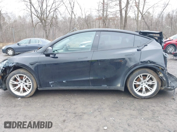 2022 Tesla Model Y Long Range with VIN 7SAYGDEE5NA016892, listed as a IAAI auction lot 41936735 with 69,136 mi miles and . Bid and sale history available at DreamBid. Image 14.