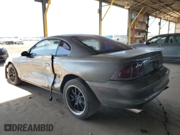 1997 Ford Mustang Cobra with VIN 1FALP47V8VF103811, listed as a Copart auction lot 56455324 with 129,499 mi miles and Salvage Title. Bid and sale history available at carsss.com. Image 2.
