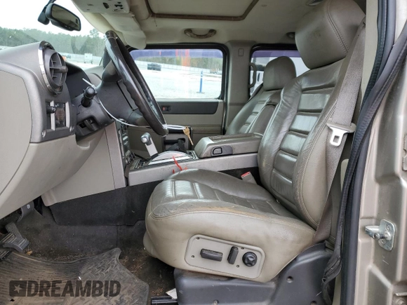 2003 Hummer H2 with VIN 5GRGN23U93H128347, listed as a Copart auction lot 49315985 with 277,074 mi miles and Salvage Title. Bid and sale history available at carsss.com. Image 7.