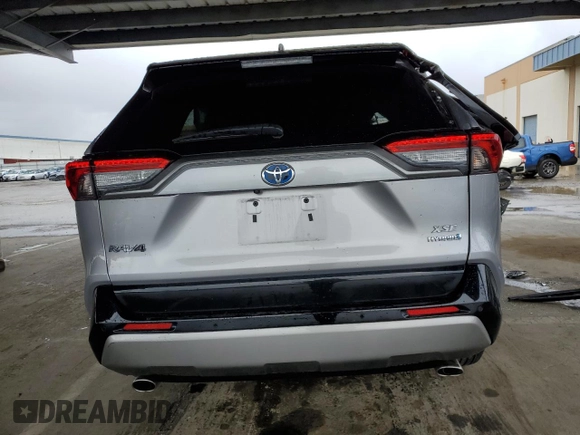 2023 Toyota RAV4 Hybrid XSE z VIN 4T3E6RFV2PU122716, wystawiony jako Copart lot #51009615 z przebiegiem 28 643 mil mil oraz Nie do naprawy • Non repairable. Historia ofert i sprzedaży dostępna na DreamBid. Obrazek 6.