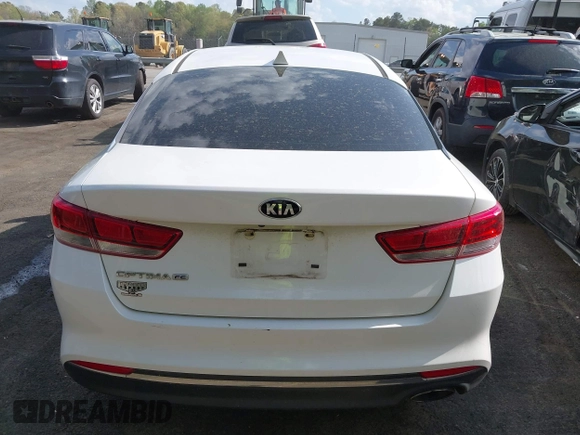 2016 Kia Optima LX with VIN KNAGT4L37G5074853, listed as a IAAI auction lot 41950918 with 151,111 mi miles. Bid and sale history available at carsss.com. Image 16.