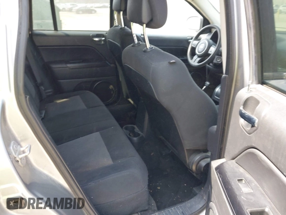 2016 Jeep Compass Sport with VIN 1C4NJDBB1GD566261, listed as a IAAI auction lot 42122853 with 212,060 mi miles. Bid and sale history available at carsss.com. Image 8.