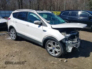 2017 Ford Escape Titanium with VIN 1FMCU0JD6HUE01006, listed as a IAAI auction lot 41632918 with 70,927 mi miles. Bid and sale history available at carsss.com. Image 1.