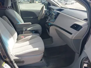 2014 Toyota Sienna LE AAS with VIN 5TDKK3DCXES432611, listed as a IAAI auction lot 40771635 with 214,145 mi miles and . Bid and sale history available at carsss.com. Image 5.