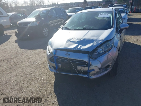 2017 Ford Fiesta SE z VIN 3FADP4BJXHM143658, wystawiony jako IAAI lot #41693045 z przebiegiem 142 361 mil mil oraz . Historia ofert i sprzedaży dostępna na DreamBid. Obrazek 6.