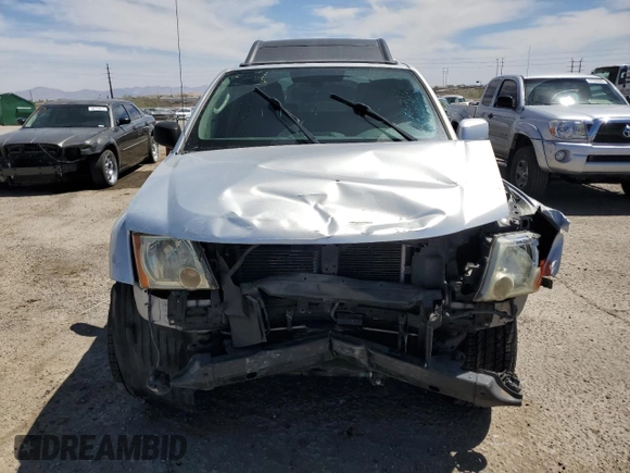 2010 Nissan Xterra S with VIN 5N1AN0NU2AC519838, listed as a Copart auction lot 57301355 with 129,990 mi miles and Salvage title. Bid and sale history available at DreamBid. Image 5.