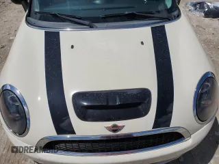 2009 MINI Hardtop S with VIN WMWMF73569TW87834, listed as a Copart auction lot 60362395 with 52,448 mi miles and Salvage title. Bid and sale history available at DreamBid. Image 11.