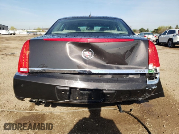 2008 Cadillac DTS 1SC z VIN 1G6KD57Y68U111388, wystawiony jako Copart lot #54204465 z przebiegiem 122 077 mil mil oraz Szkoda całkowita • Salvage title. Historia ofert i sprzedaży dostępna na DreamBid. Obrazek 6.