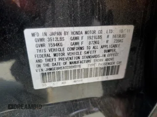 2012 Honda Fit Sport with VIN JHMGE8H5XCC006016, listed as a Copart auction lot 52941995 with 196,312 mi miles and Salvage Title. Bid and sale history available at carsss.com. Image 13.
