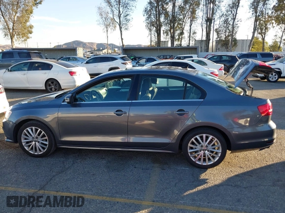 2015 Volkswagen Jetta Sport with VIN 3VWD17AJ2FM318669, listed as a IAAI auction lot 41266868 with 124,539 mi miles and . Bid and sale history available at DreamBid. Image 14.