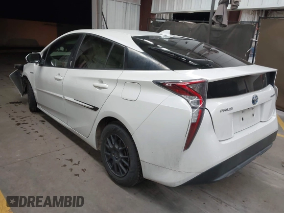 2016 Toyota Prius Two with VIN JTDKBRFU3G3513060, listed as a IAAI auction lot 41789034 with 153,391 mi miles and . Bid and sale history available at DreamBid. Image 3.