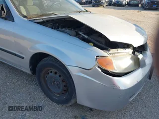 2001 Mazda Protege DX with VIN JM1BJ222810410482, listed as a IAAI auction lot 40799727 with 159,446 mi miles and . Bid and sale history available at DreamBid. Image 14.