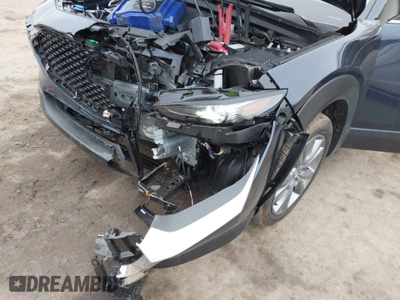 2025 Mazda CX-30 S Preferred with VIN 3MVDMBCMXSM752383, listed as a IAAI auction lot 41555027 with 785 mi miles and . Bid and sale history available at DreamBid. Image 6.