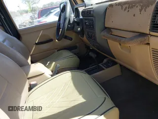 2000 Jeep Wrangler Sahara with VIN 1J4FA59S8YP763468, listed as a IAAI auction lot 41554183 with 182,922 mi miles. Bid and sale history available at carsss.com. Image 5.